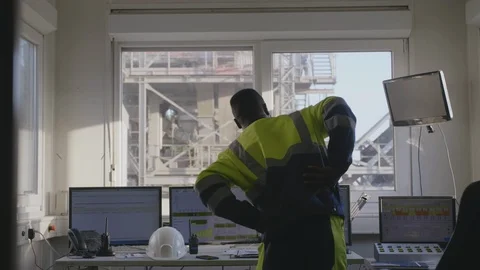 Industrial worker stretching at work Video stock 114348548