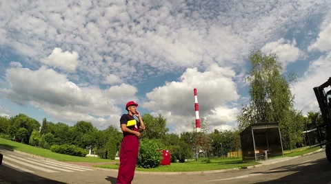Industrial Worker Talking With Cell Phone in Factory Stock Footage 68581845