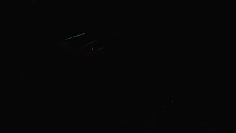 Industrial worker trainee slowly perform spot electrical welding causing spark Stock Footage 102571768