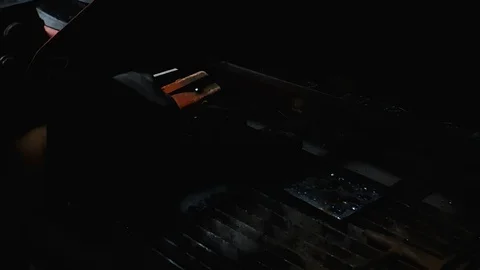 Industrial worker trainee slowly perform spot electrical welding causing spark Stock-Footage 102572072