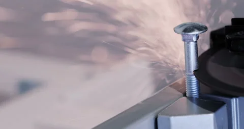 Industrial worker using angle grinder and cutting steel Stock Footage 129560292