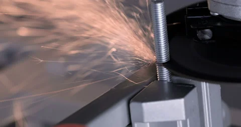 Industrial worker using angle grinder and cutting steel Stock Footage 130994586