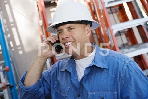 Industrial Worker Using Cell Phone Stock Photos
