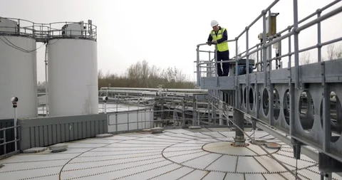Industrial worker using a digital tablet on site Stock Footage 88914915