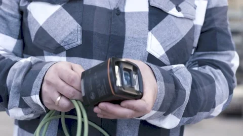 Industrial worker using a sensor Stock Footage 149294095