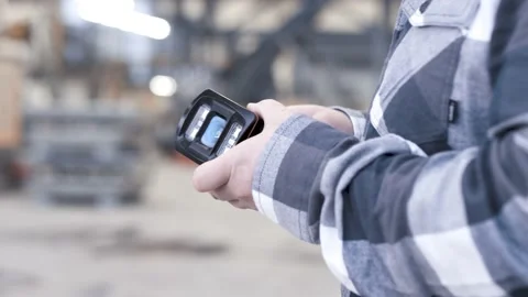 Industrial worker using a sensor Stock Footage 149294222