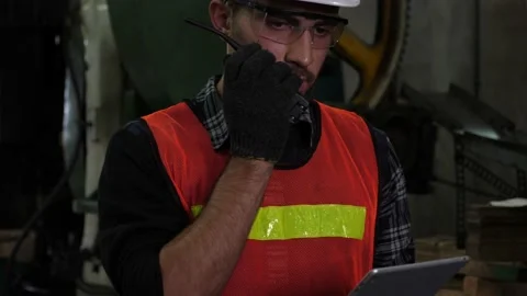 Industrial worker using walkie-talkie radio. Stock Footage 173101882
