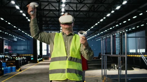 Industrial worker with VR glasses interacting with virtual reality simulation Stock Footage 322207397