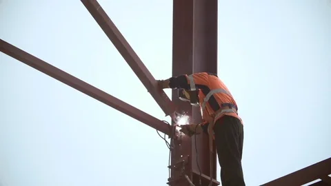 Industrial Worker Welding high at the Construction Site Stock Footage 73961875