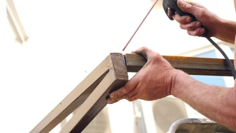 Industrial worker welding high at the construction site Stock Footage 80697785