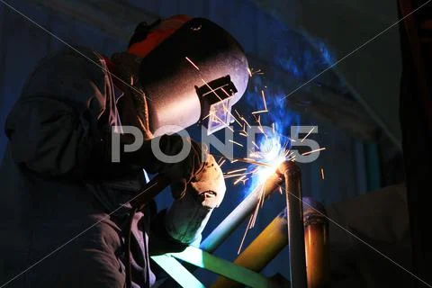 Industrial Worker Welding