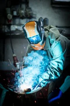 Industrial worker welding Stock Photos