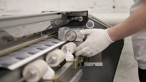 Industrial worker working on machine in factory Stock-Footage 98859384