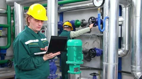 Industrial workers with a notebook Stock Footage 24672690