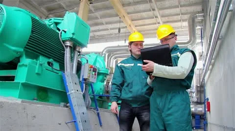 Industrial workers with a notebook Video stock 24672700