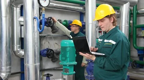 Industrial workers in power plant Stock Footage 10900860