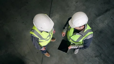 Industrial Workers Shaking Hands with Digital Tablet in Factory Stock Footage 345012972