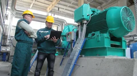 Industrial workers, teamwork Stock Footage 10909413