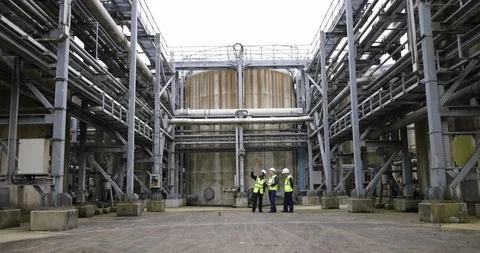 Industrial workers using a digital tablet on site Stock Footage 88773417