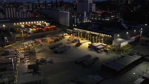 Industrial Yard with Stacked Materials and Forklifts at Twilight in Dublin Vídeo Stock 332444572
