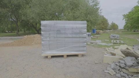Industrial zone with building material block on pallet Stock Footage 248703244