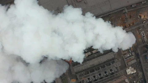 Industrial zone with a large pipe thick white smoke is poured from the factory Stock Footage 100262460