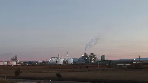 Industrial zone with a large pipe thick white smoke is poured from the factor Stock Footage 102718187