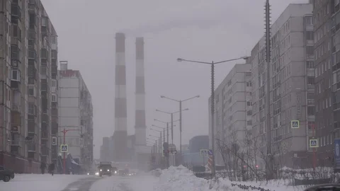 Industrial zone with a large red and white pipe thick white smoke is poured Stock Footage 98200217