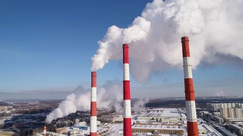 Industrial zone with a large red and white pipe thick white smoke is poured Stock Footage 124464638