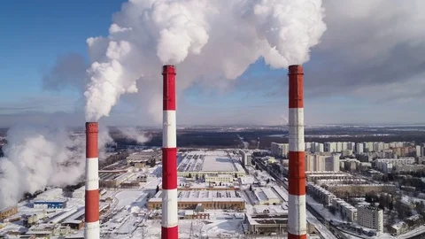 Industrial zone with a large red and white pipe thick white smoke is poured Stock Footage 124465301