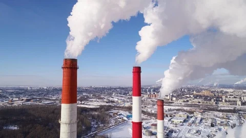 Industrial zone with a large red and white pipe thick white smoke is poured Stock Footage 124467246