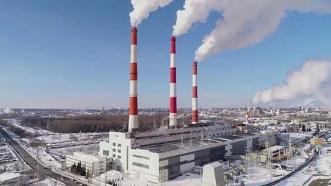 Industrial zone with a large red and white pipe thick white smoke is poured Stock Footage 124469102