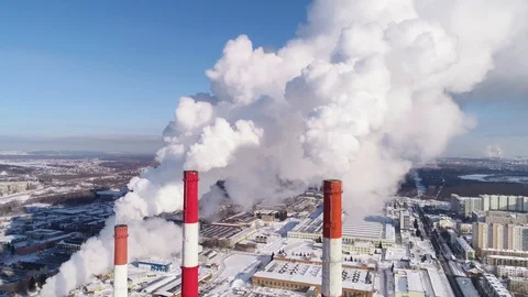 Industrial zone with a large red and white pipe thick white smoke is poured Stock Footage 124469345