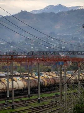 Industrial zone. Loading station. Train wires. Fuel tanks. Stock Photos
