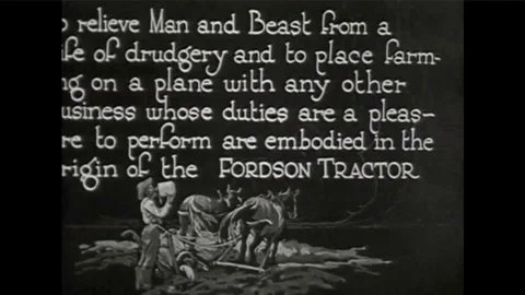 Industry of the 1920s helps develop Ford cars. Polluting factory smokestacks. Stock Footage 100857392