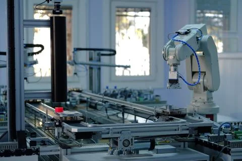 Industry 4.0 concept; artificial intelligence in smart factory prototype Stock Photos