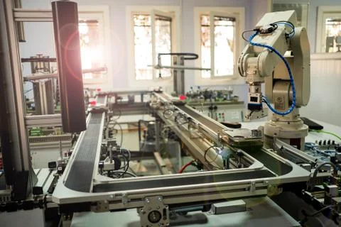 Industry 4.0 concept; artificial intelligence in smart factory prototype Stock Photos
