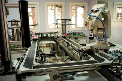 Industry 4.0 concept; artificial intelligence in smart factory prototype Stock Photos