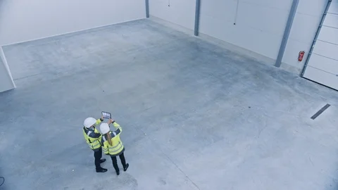 Industry 4.0 Modern Factory: Two Engineers Use Digital Tablet Computer with AR Stock Footage 123467627