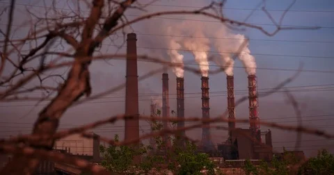 Industry And Pollution - environmental problems. Smoke from factory pipes Stock Footage 71685400
