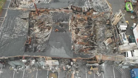 Industry building Burnt down and Destroyed by fire, Aerial Stock Footage 143732606