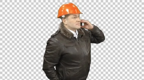An industry businessman technical manager standing with a mobile phone, Alpha  Stock Footage 46982311