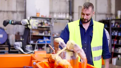 Industry employee working on machine fine tuning. Stock-Footage 259521395