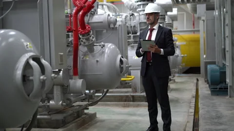 Industry Engineer manager using digital tablet checking information and safet Stock Footage 154283607