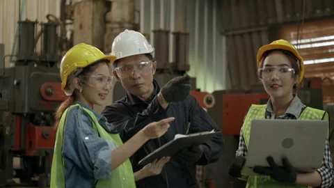 Industry engineer team is talking to work in factory. Stock Footage 140270128