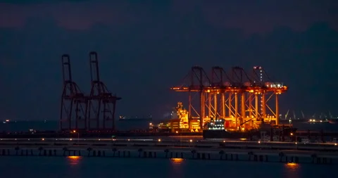 Industry landscape on sunset Engineering shipping crane depot at logistic e.. Stock Footage 261633146