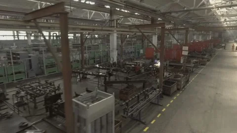 Industry. Plant engineering. Video shot by drone, the span of welding. Видео 101780646