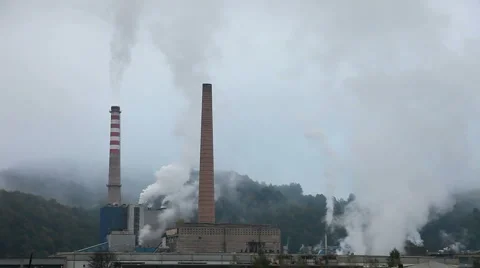 Industry Pollution in nature time laps looping Stock Footage 1071452