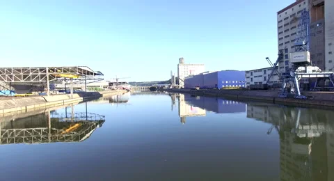 Industry river Shot with perfect reflection and typical buildings. Stock Footage 66300973