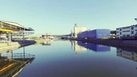 Industry river Shot with perfect reflection and typical buildings. Stock Footage 82532519